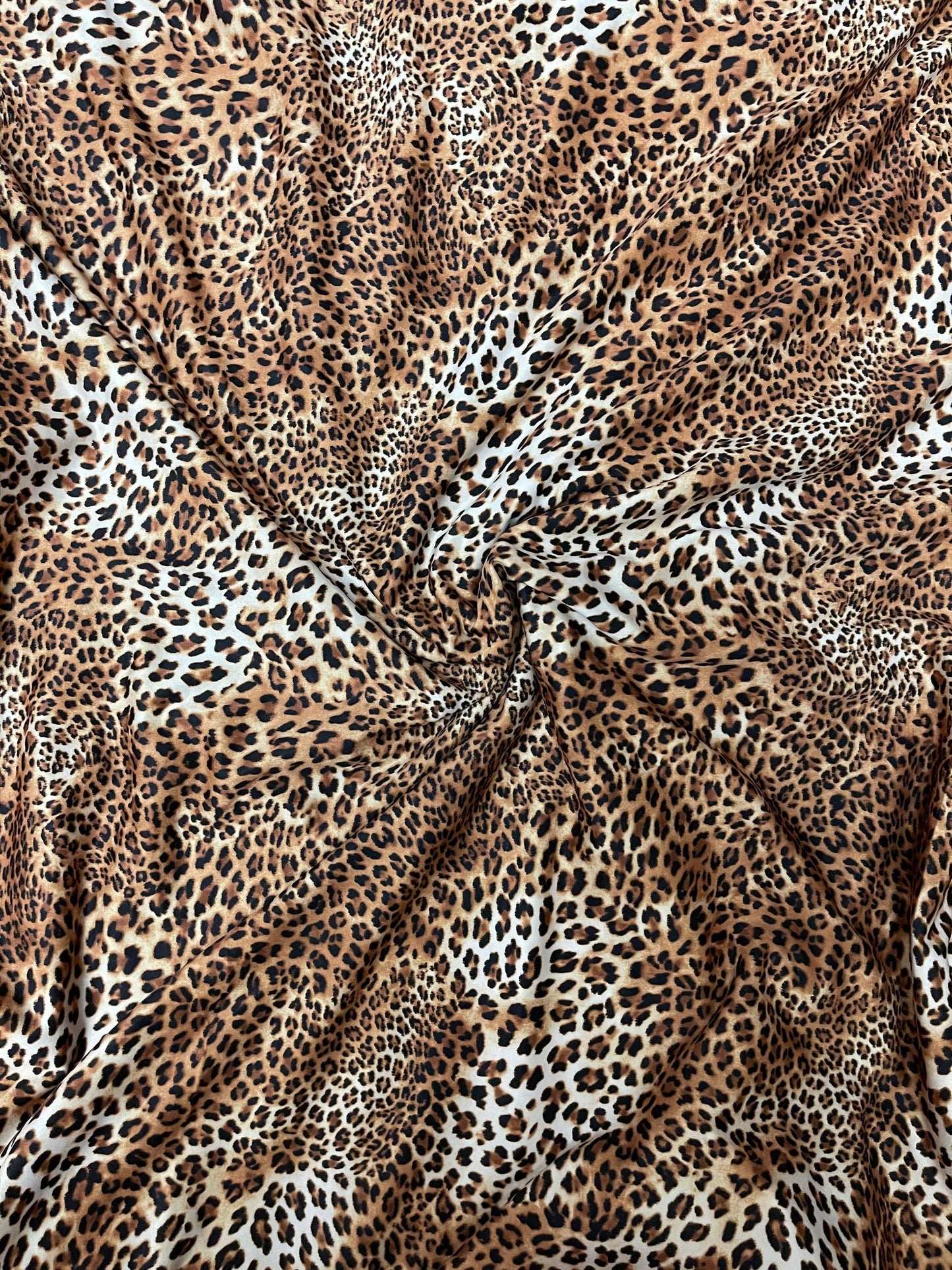 Exotic cheetah design print on poly spandex 4-way stretch 58/60” Sold by the YD. Ships Worldwide from Los Ángeles California USA.