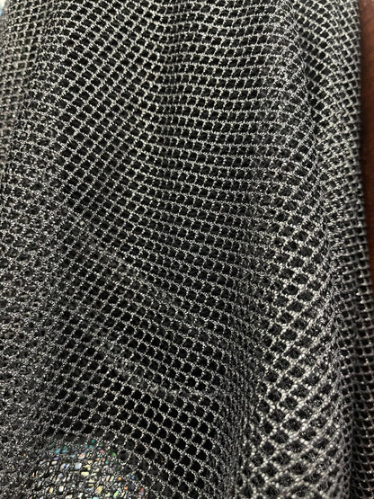 Metallic fishnet Black/Silver 2-way stretch 58/60” Sold by the YD. Ships Worldwide from Los Angeles California USA.