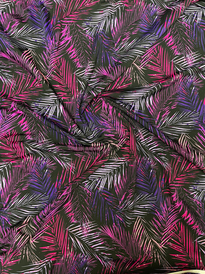 Tropical leaves design Black/Multicolor print on nylon spandex 4-way stretch 58/60” Sold by the YD. Ships Worldwide from Los Angeles CA