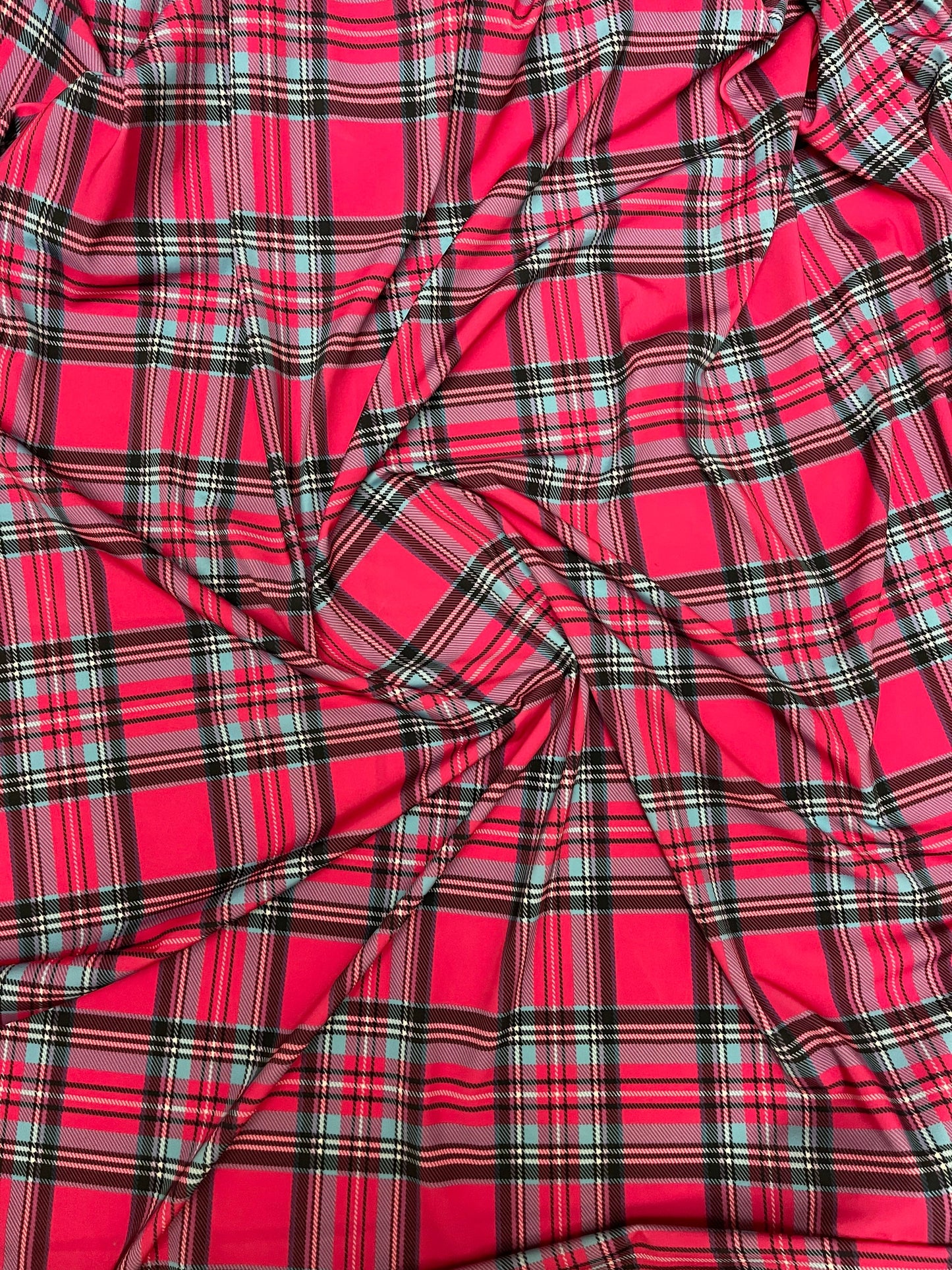 Plaid modern design hot pink multicolor print on great quality of nylon spandex 4-way stretch 58/60” Sold by the YD.