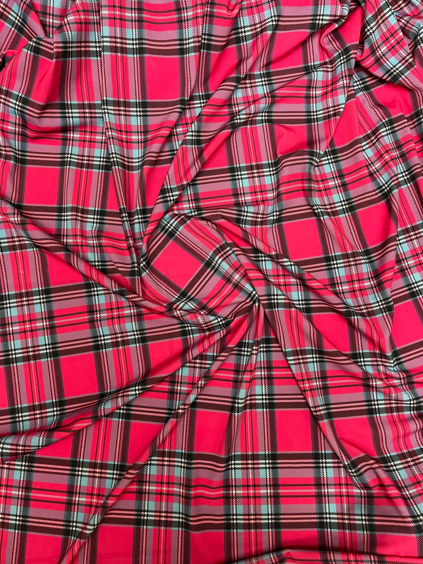 Plaid modern design hot pink multicolor print on great quality of nylon spandex 4-way stretch 58/60” Sold by the YD.