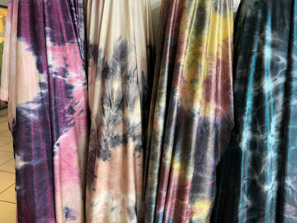 Tie dye design with foggy foil print on poly brushed spandex 2-way stretch 58/60” light weight 58/60” Sold by the YD. Ships  Worldwide