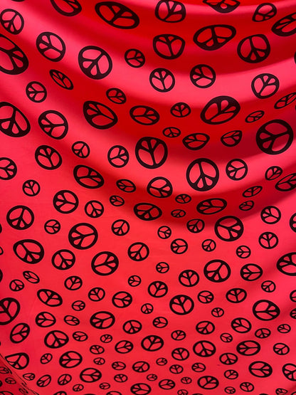 Love & peace design print on best quality of nylon spandex 4-way stretch 58/60” Sold by the YD. Ships Worldwide from Los Ángeles California