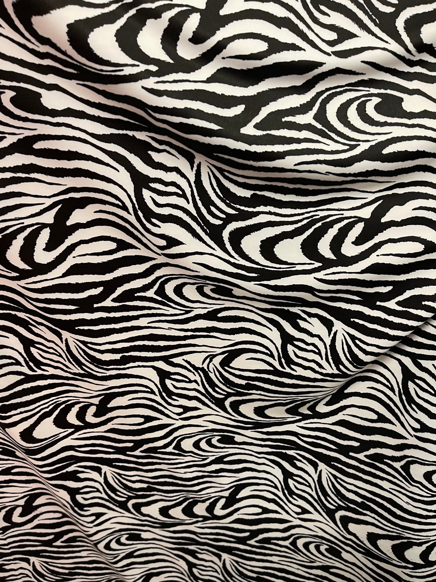 Exotic Zebra design print on great quality of nylon spandex 4-way stretch 58/60” Sold by the YD. Ships Worldwide from Los Ángeles California