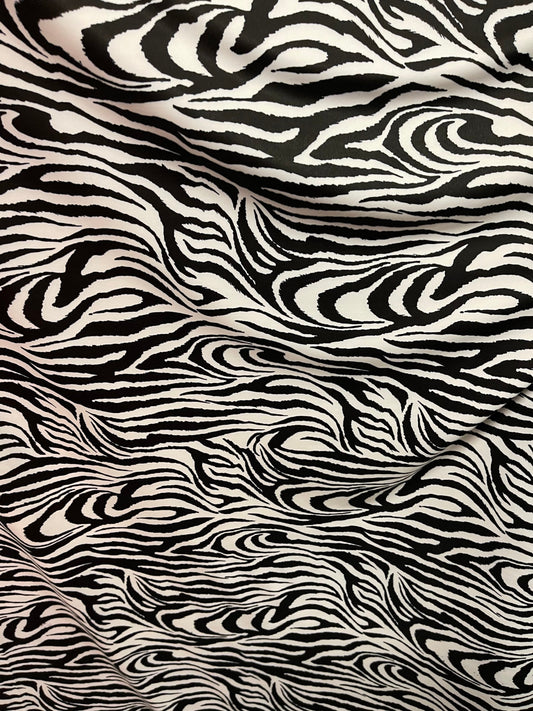 Exotic Zebra design print on great quality of nylon spandex 4-way stretch 58/60” Sold by the YD. Ships Worldwide from Los Ángeles California