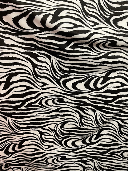 Exotic Zebra design print on great quality of nylon spandex 4-way stretch 58/60” Sold by the YD. Ships Worldwide from Los Ángeles California