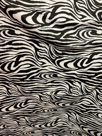 Exotic Zebra design print on great quality of nylon spandex 4-way stretch 58/60” Sold by the YD. Ships Worldwide from Los Ángeles California