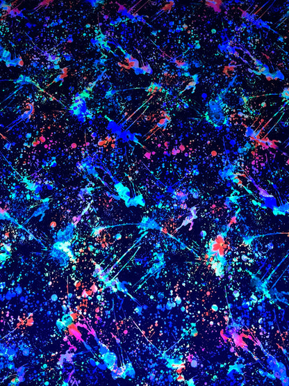 New splatter paint design Black/Multicolor print on nylon spandex 4-way stretch 58/60” Sold by the YD. It glow in the dark with Black Light