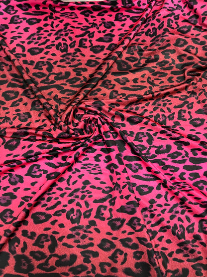 Exotic Leopard design print on ombre hot pink spandex 4-way stretch 58/60” Sold by the YD. Ships Worldwide from Los Angeles California USA.