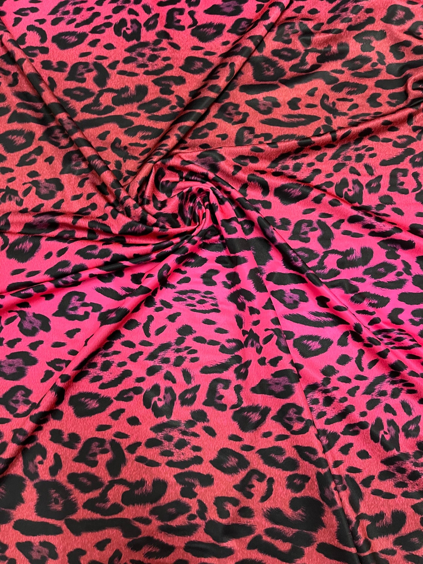 Exotic Leopard design print on ombre hot pink spandex 4-way stretch 58/60” Sold by the YD. Ships Worldwide from Los Angeles California USA.