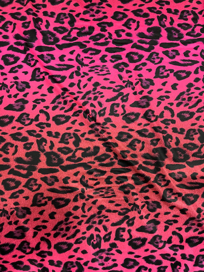 Exotic Leopard design print on ombre hot pink spandex 4-way stretch 58/60” Sold by the YD. Ships Worldwide from Los Angeles California USA.