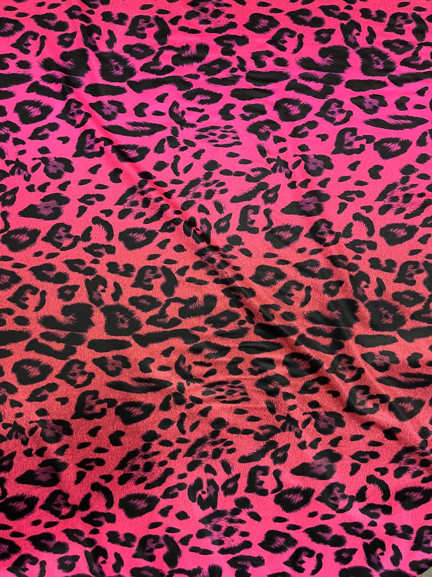 Exotic Leopard design print on ombre hot pink spandex 4-way stretch 58/60” Sold by the YD. Ships Worldwide from Los Angeles California USA.