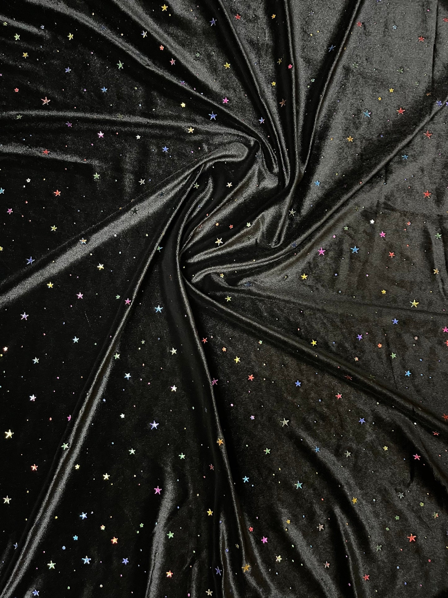 Stars design multicolor on great quality of stretch velvet 4-way stretch 58/60” Sold by the YD. Ships Worldwide from Los Angeles California