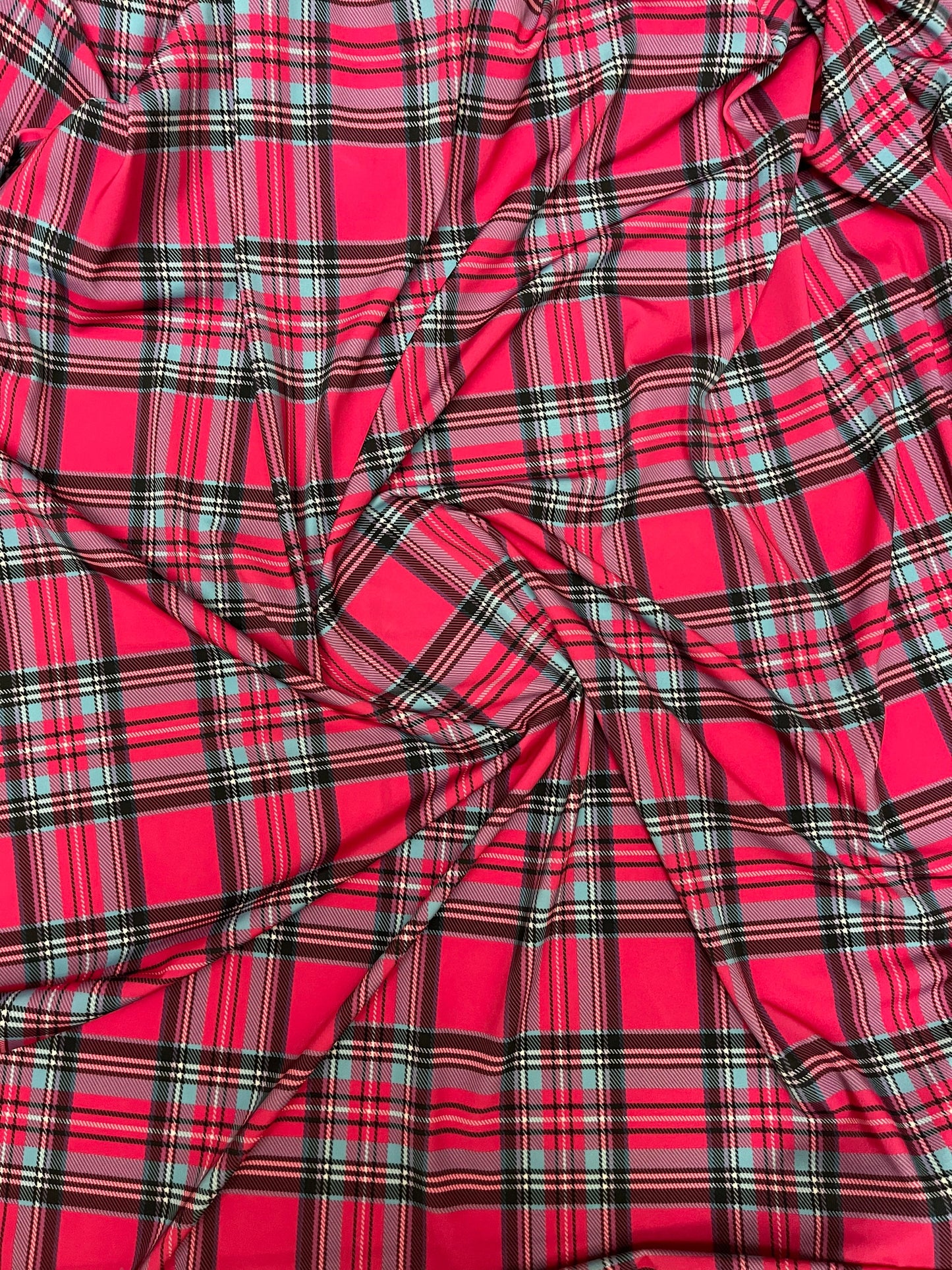 Plaid modern design hot pink multicolor print on great quality of nylon spandex 4-way stretch 58/60” Sold by the YD.