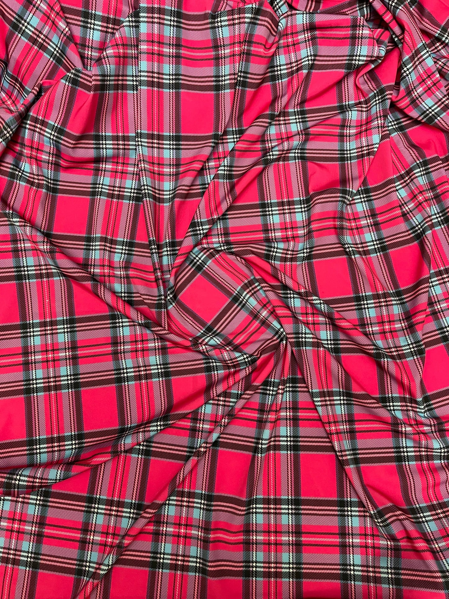 Plaid modern design hot pink multicolor print on great quality of nylon spandex 4-way stretch 58/60” Sold by the YD.