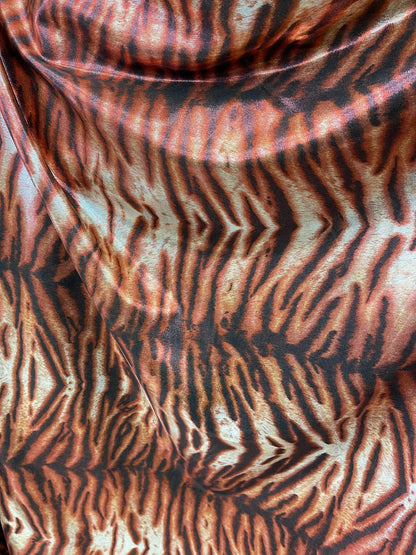 Exotic Tiger design print on poly spandex heavy quality 2-way stretch 58/60” Sold by the YD. Ships Worldwide from Los Angeles California USA