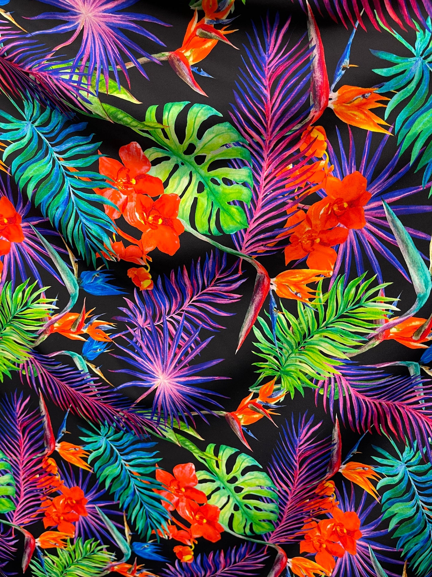 New Hawaiian print black multicolor print on best quality of nylon spandex 4-way stretch 58/60” Sold by the YD. Ships Worldwide from L.A CA