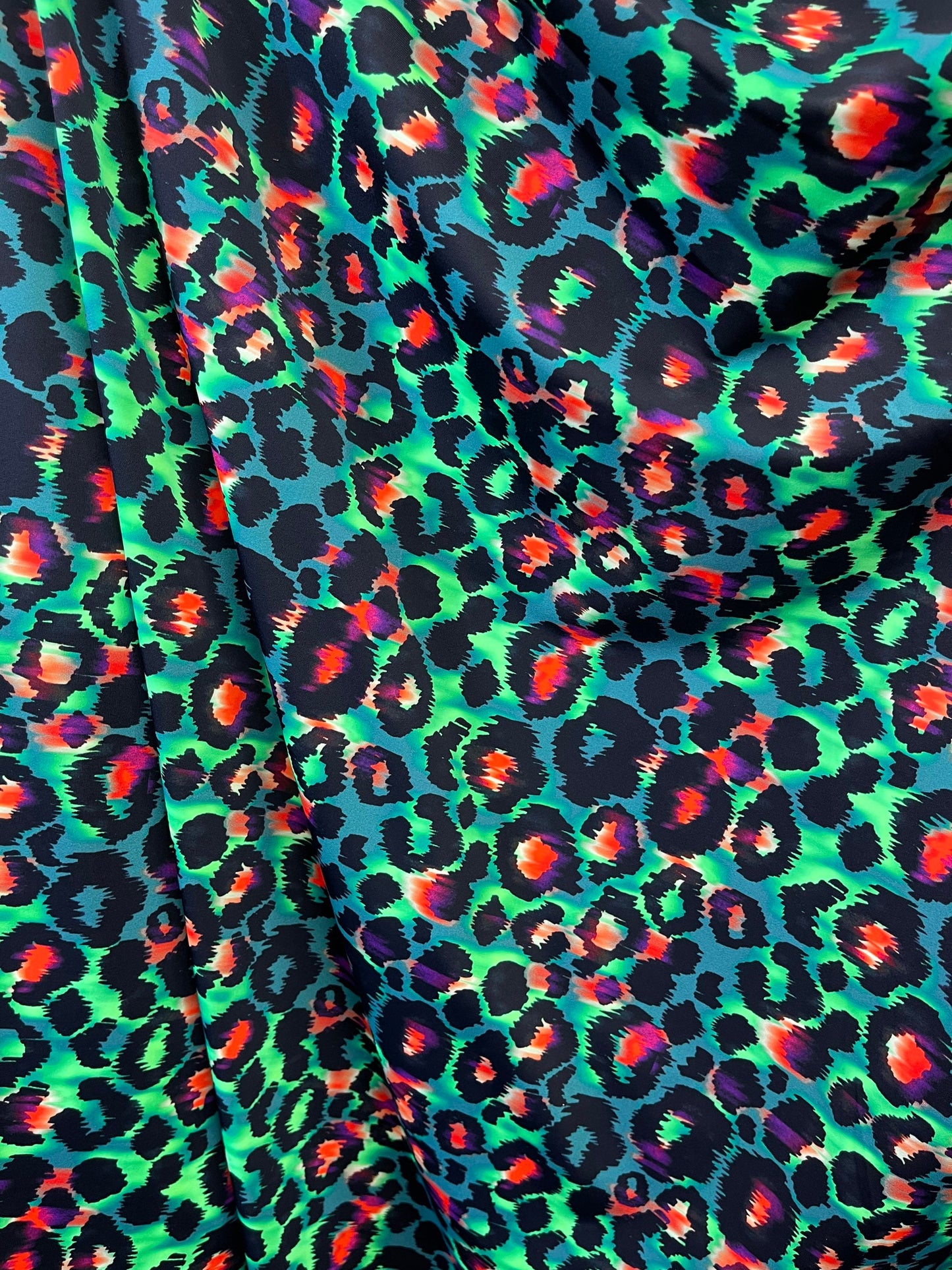 Exotic Leopard design green/multicolor print on best quality of nylon spandex 4-way stretch 58/60” Sold by the YD. Ships Worldwide from L.A