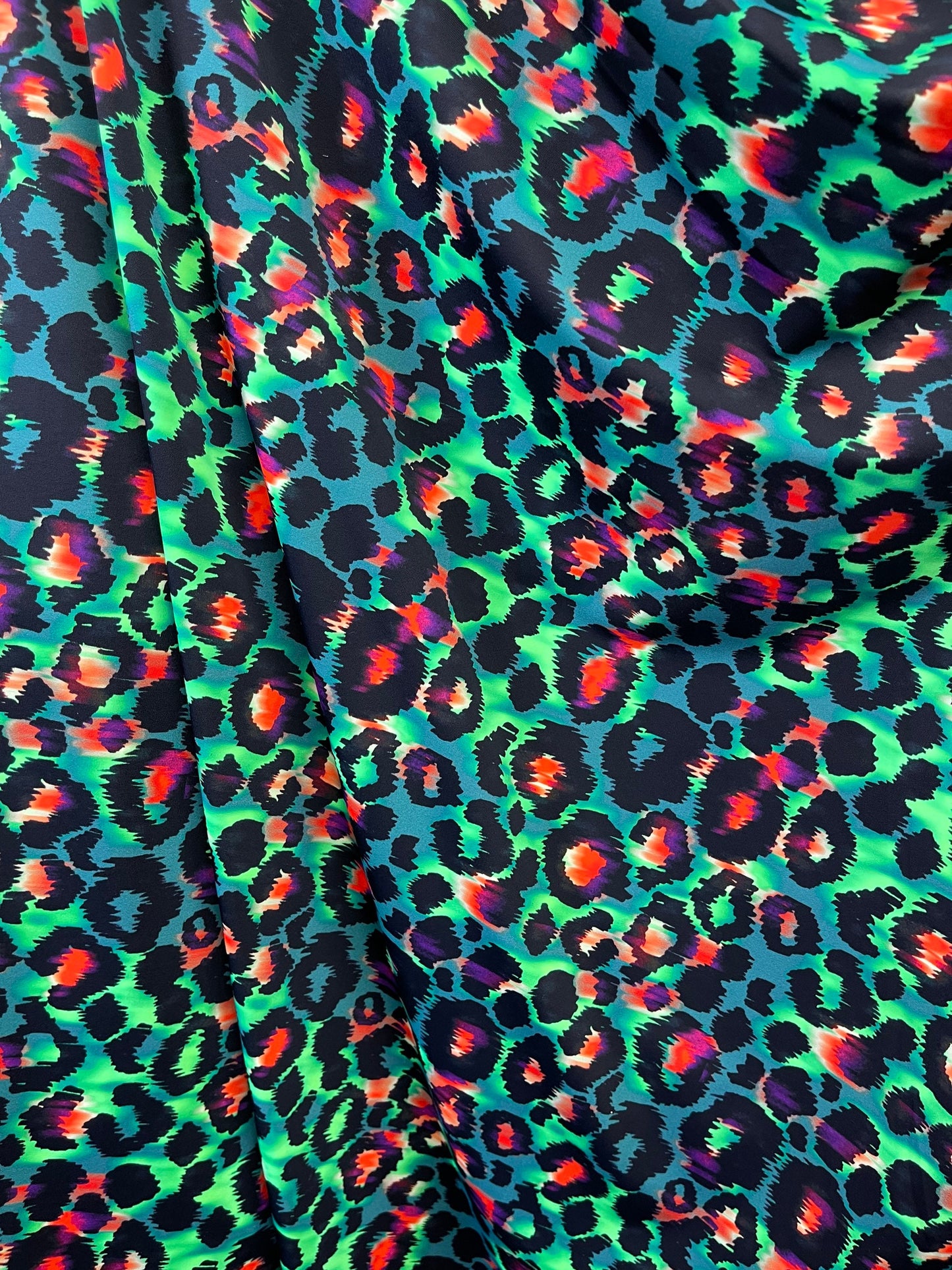 Exotic Leopard design green/multicolor print on best quality of nylon spandex 4-way stretch 58/60” Sold by the YD. Ships Worldwide from L.A