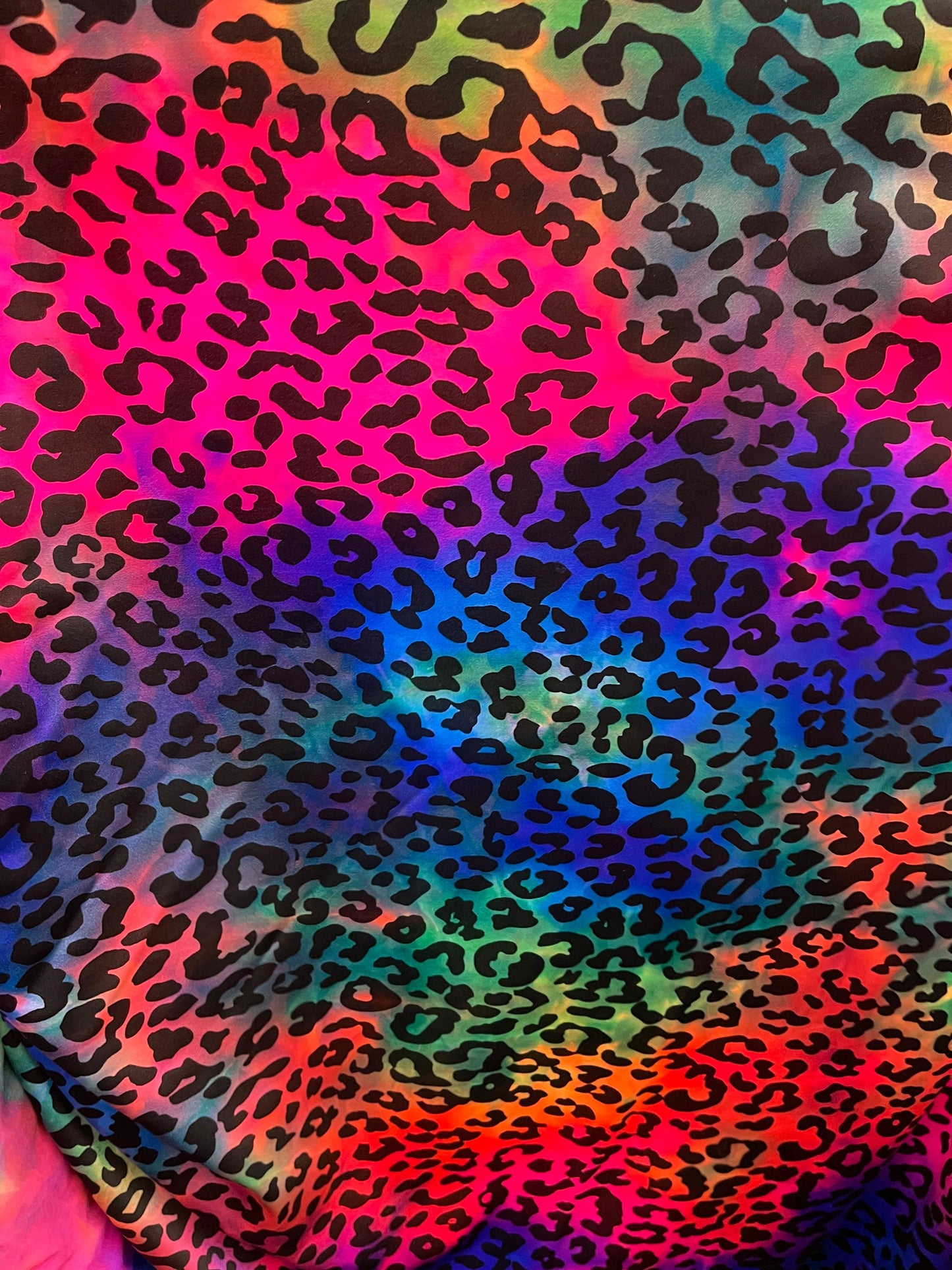 Premium Leopard design print on tie dye nylon spandex 4-way stretch 58/60” Sold by the YD. Ships Worldwide from Los Ángeles California USA.