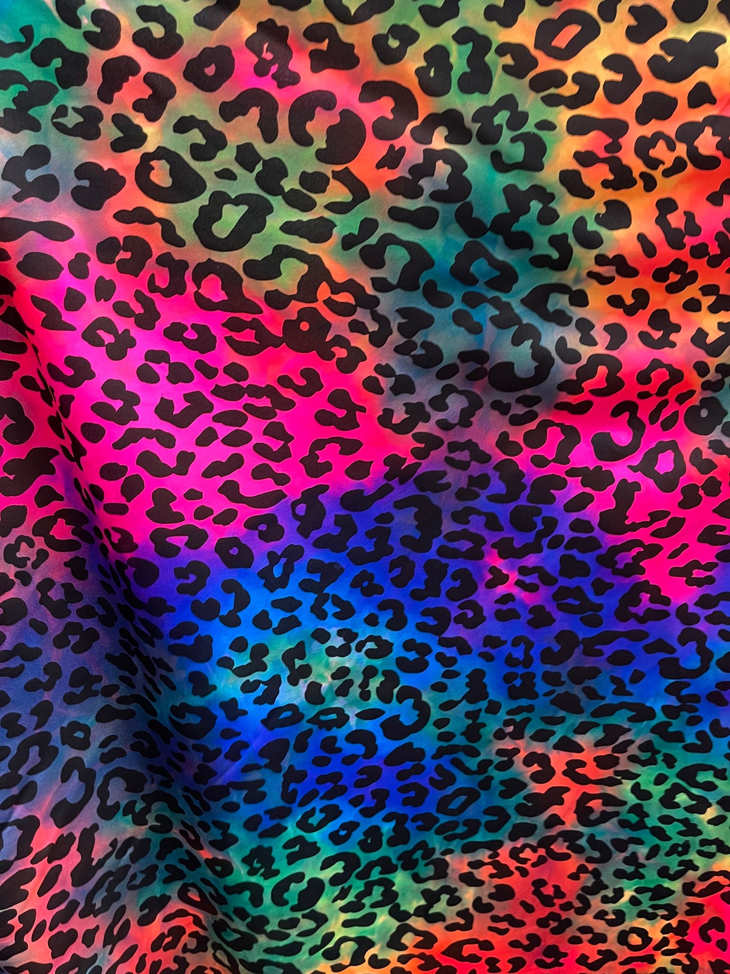 Premium Leopard design print on tie dye nylon spandex 4-way stretch 58/60” Sold by the YD. Ships Worldwide from Los Ángeles California USA.