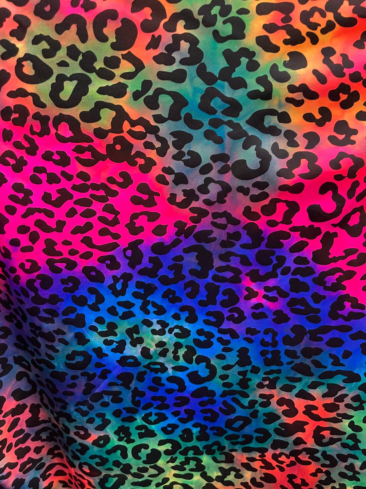 Premium Leopard design print on tie dye nylon spandex 4-way stretch 58/60” Sold by the YD. Ships Worldwide from Los Ángeles California USA.