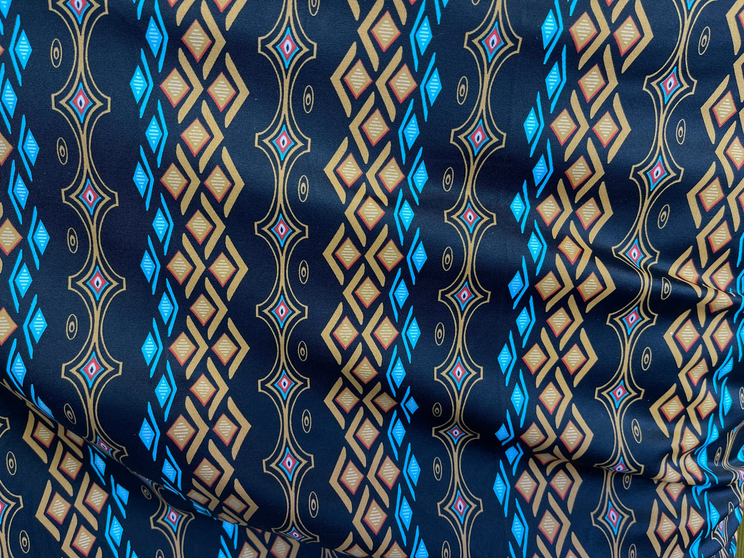 African design Black Multicolor print on nylon spandex 4-way stretch 58/60” Sold by the YD. Ships Worldwide from Los Angeles California USA.