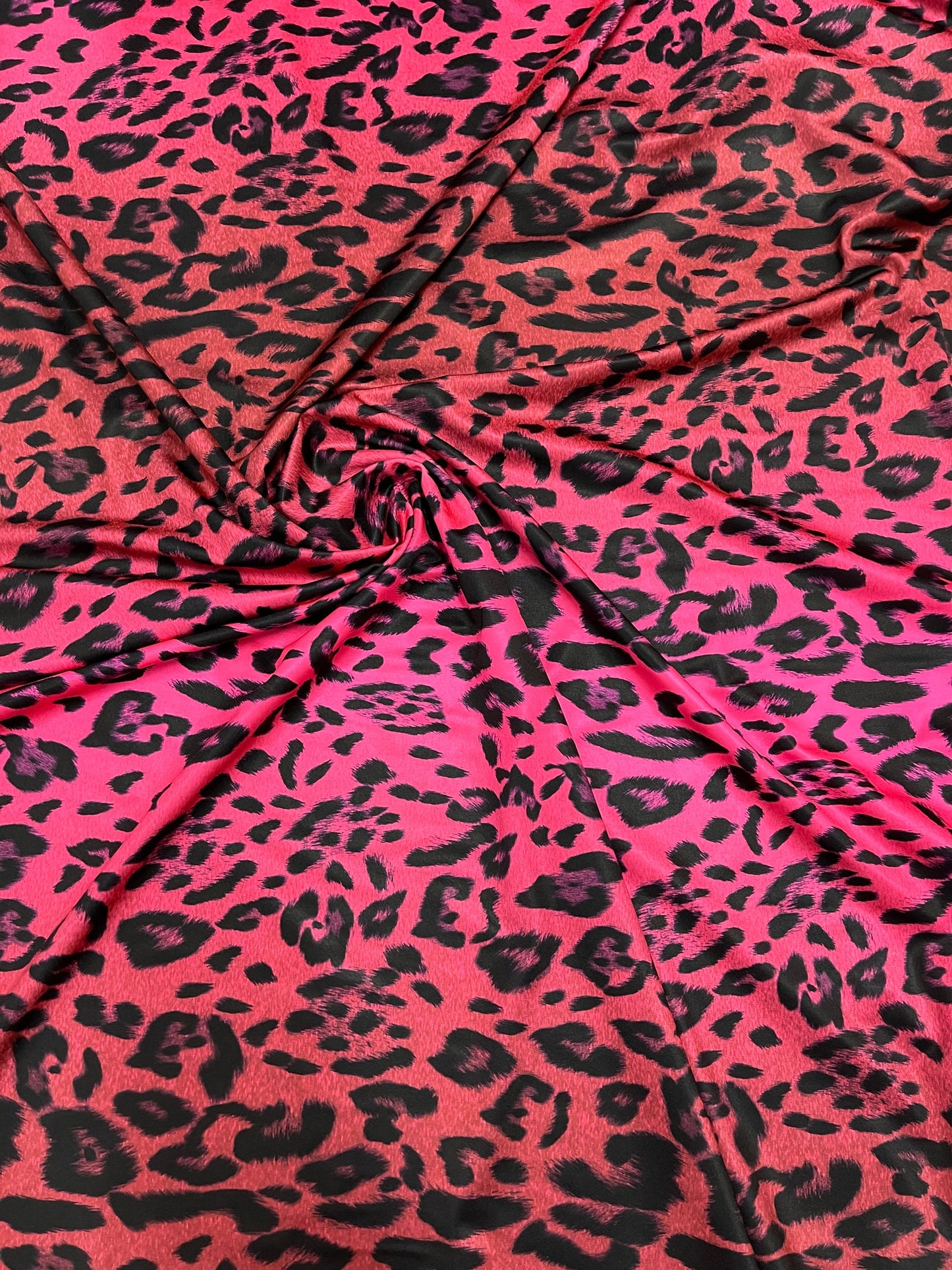 Exotic Leopard design print on ombre hot pink spandex 4-way stretch 58/60” Sold by the YD. Ships Worldwide from Los Angeles California USA.