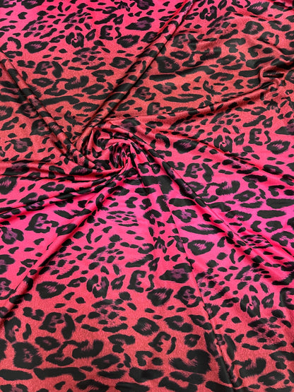 Exotic Leopard design print on ombre hot pink spandex 4-way stretch 58/60” Sold by the YD. Ships Worldwide from Los Angeles California USA.