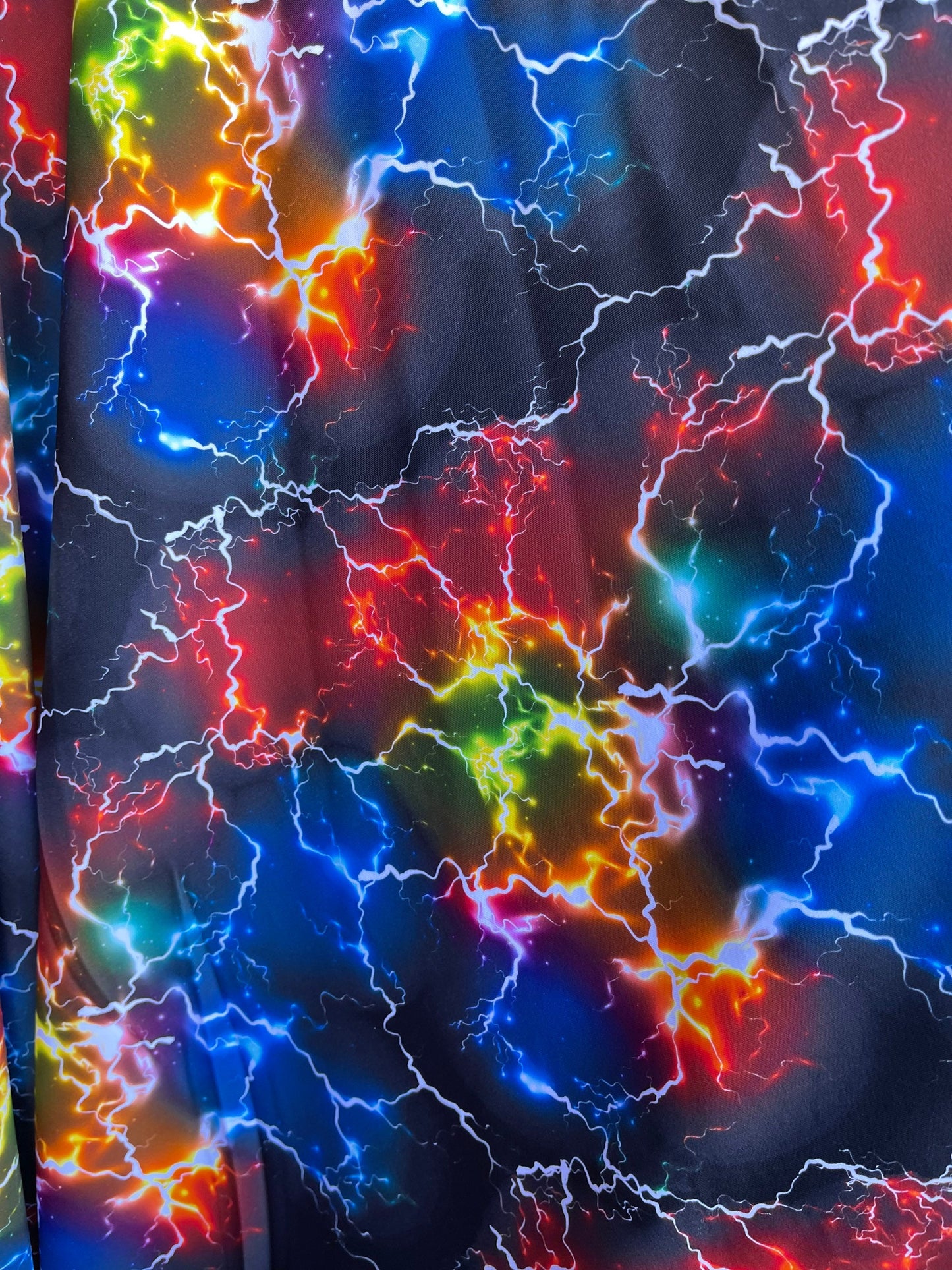 Thunder storm design Black multicolor print on best quality of nylon spandex 4-way stretch 58/60” Sold by the YD. Ships Worldwide from L.A