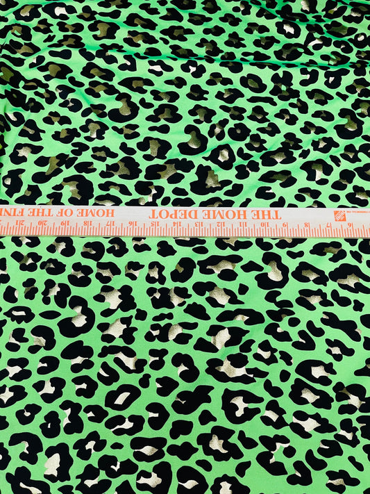 New Exotic Leopard design metallic nylon spandex 4-way stretch 58/60” Sold by the yd. Ships Worldwide from Los Angeles California USA.