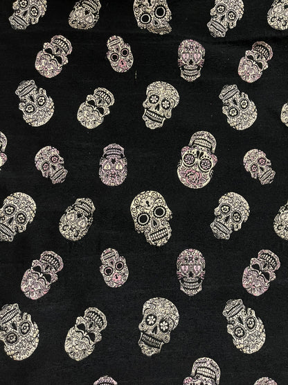 Skull design embroidered on metallic Chenille non stretch black/gold 58/60” Sold by the YD. Ships Worldwide from Los Angeles CA USA.