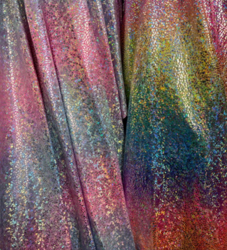 Hologram reptile design metallic multicolor spandex 4-way stretch 58/60” Sold by the YD. Ships Worldwide from Los Angeles California