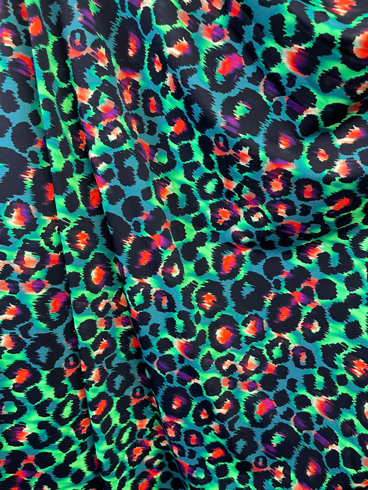 Exotic Leopard design green/multicolor print on best quality of nylon spandex 4-way stretch 58/60” Sold by the YD. Ships Worldwide from L.A