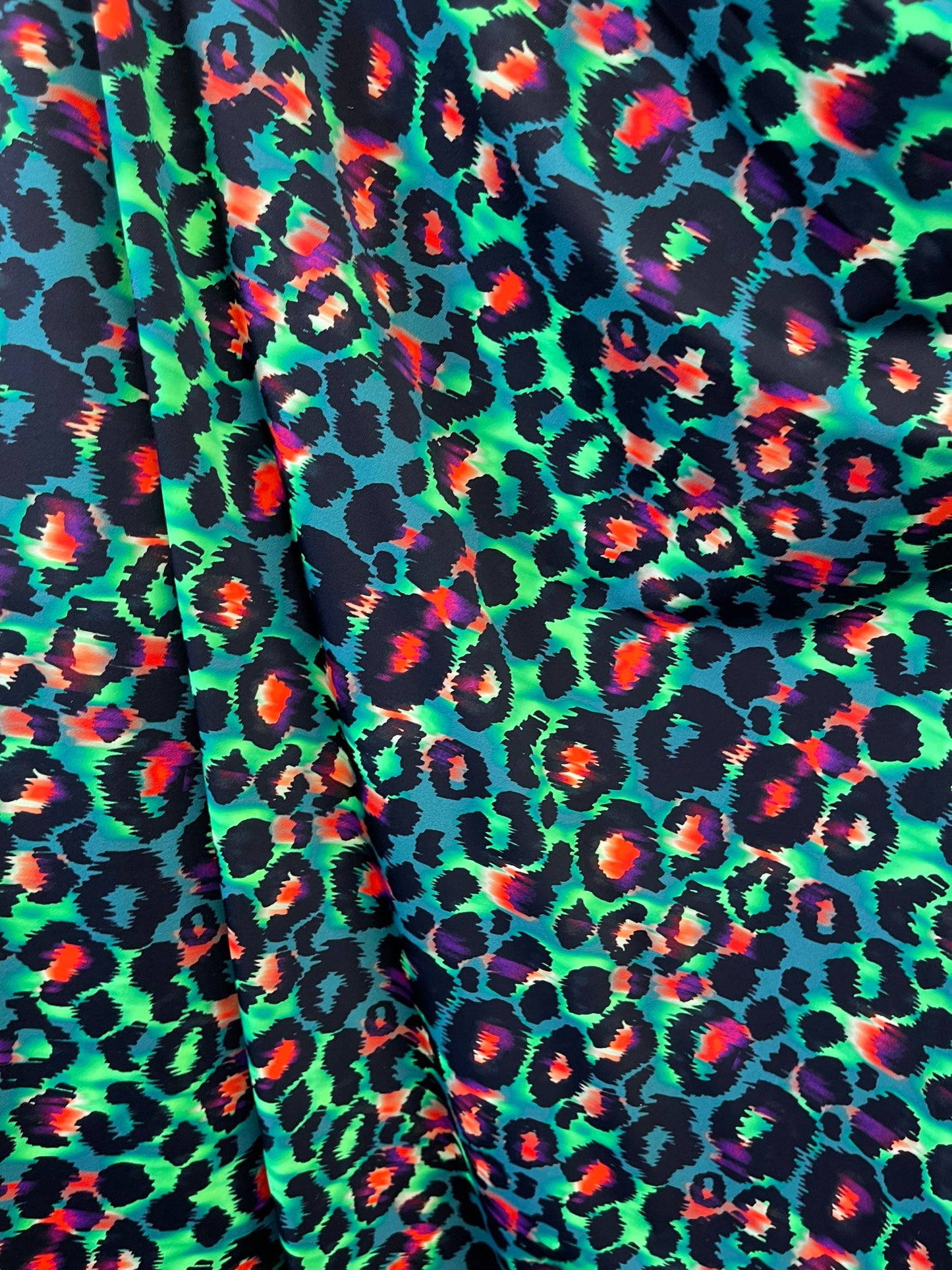 Exotic Leopard design green/multicolor print on best quality of nylon spandex 4-way stretch 58/60” Sold by the YD. Ships Worldwide from L.A