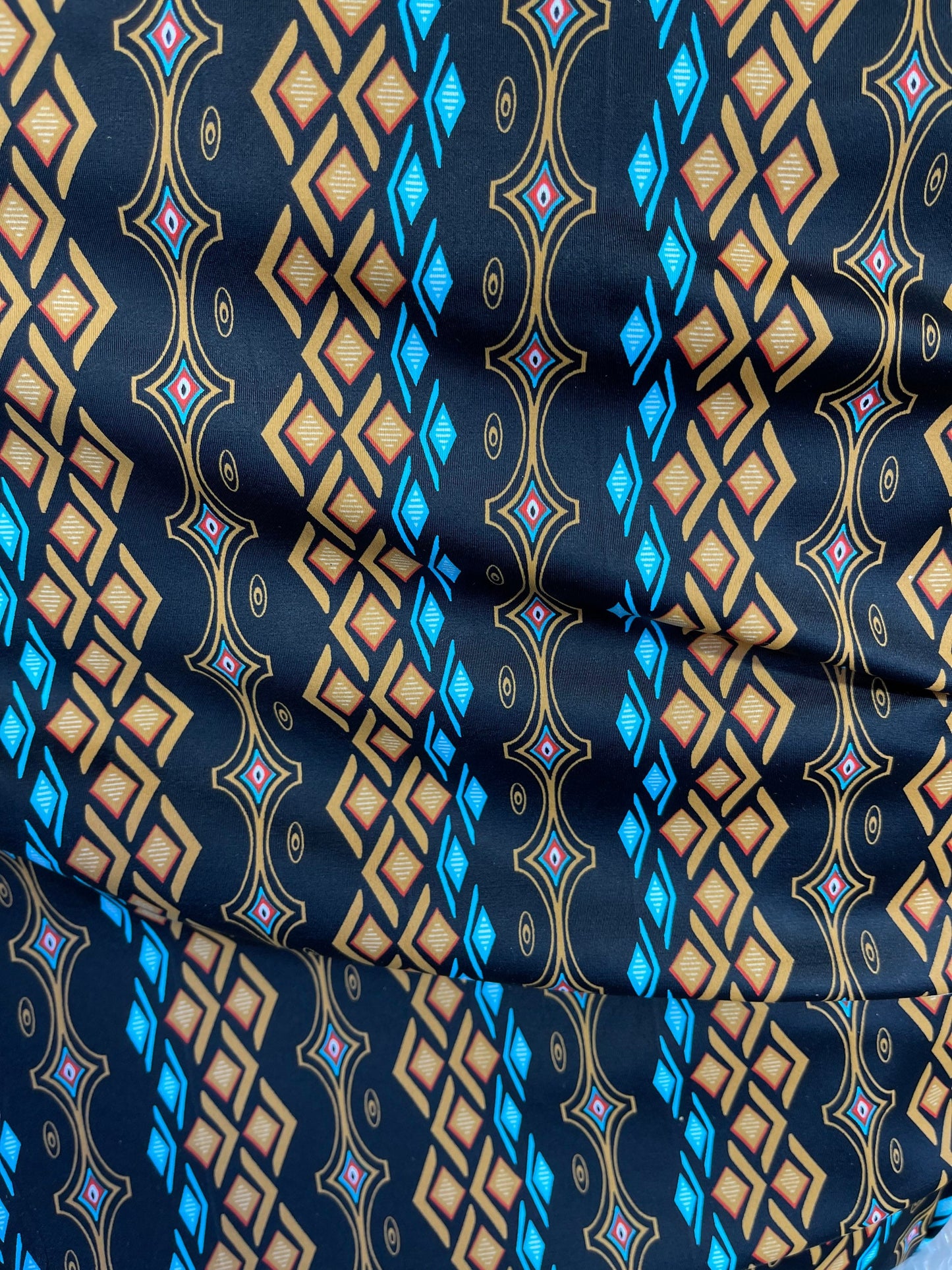 African design Black Multicolor print on nylon spandex 4-way stretch 58/60” Sold by the YD. Ships Worldwide from Los Angeles California USA.