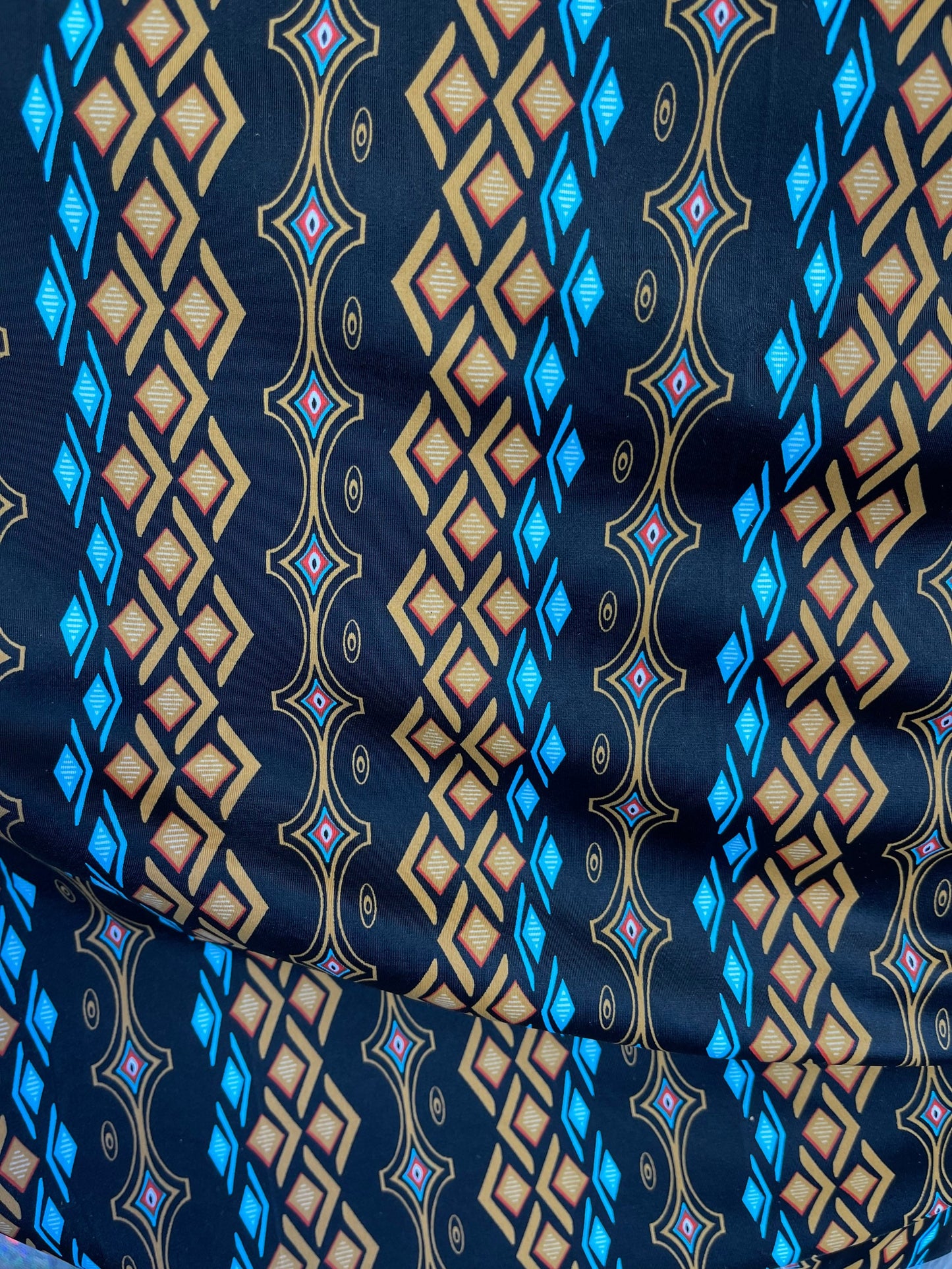 African design Black Multicolor print on nylon spandex 4-way stretch 58/60” Sold by the YD. Ships Worldwide from Los Angeles California USA.