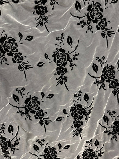 Flower design stretch mesh with lining including 50/52" black/nude sold by the YD. Ships worldwide from Los Angeles California USA.