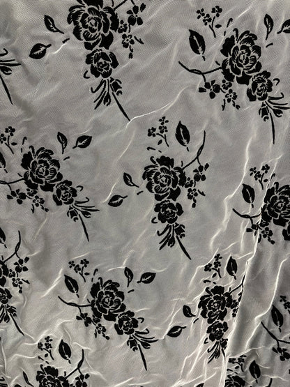 Flower design stretch mesh with lining including 50/52" black/nude sold by the YD. Ships worldwide from Los Angeles California USA.