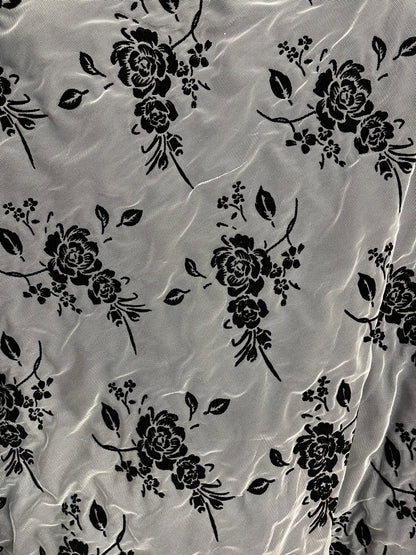 Flower design stretch mesh with lining including 50/52" black/nude sold by the YD. Ships worldwide from Los Angeles California USA.