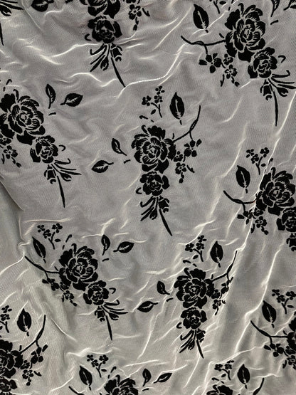 Flower design stretch mesh with lining including 50/52" black/nude sold by the YD. Ships worldwide from Los Angeles California USA.