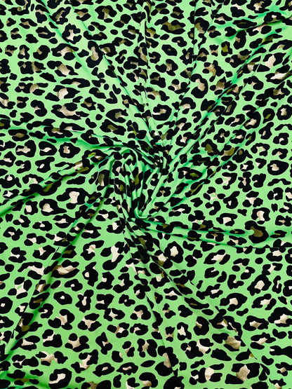 New Exotic Leopard design metallic nylon spandex 4-way stretch 58/60” Sold by the yd. Ships Worldwide from Los Angeles California USA.