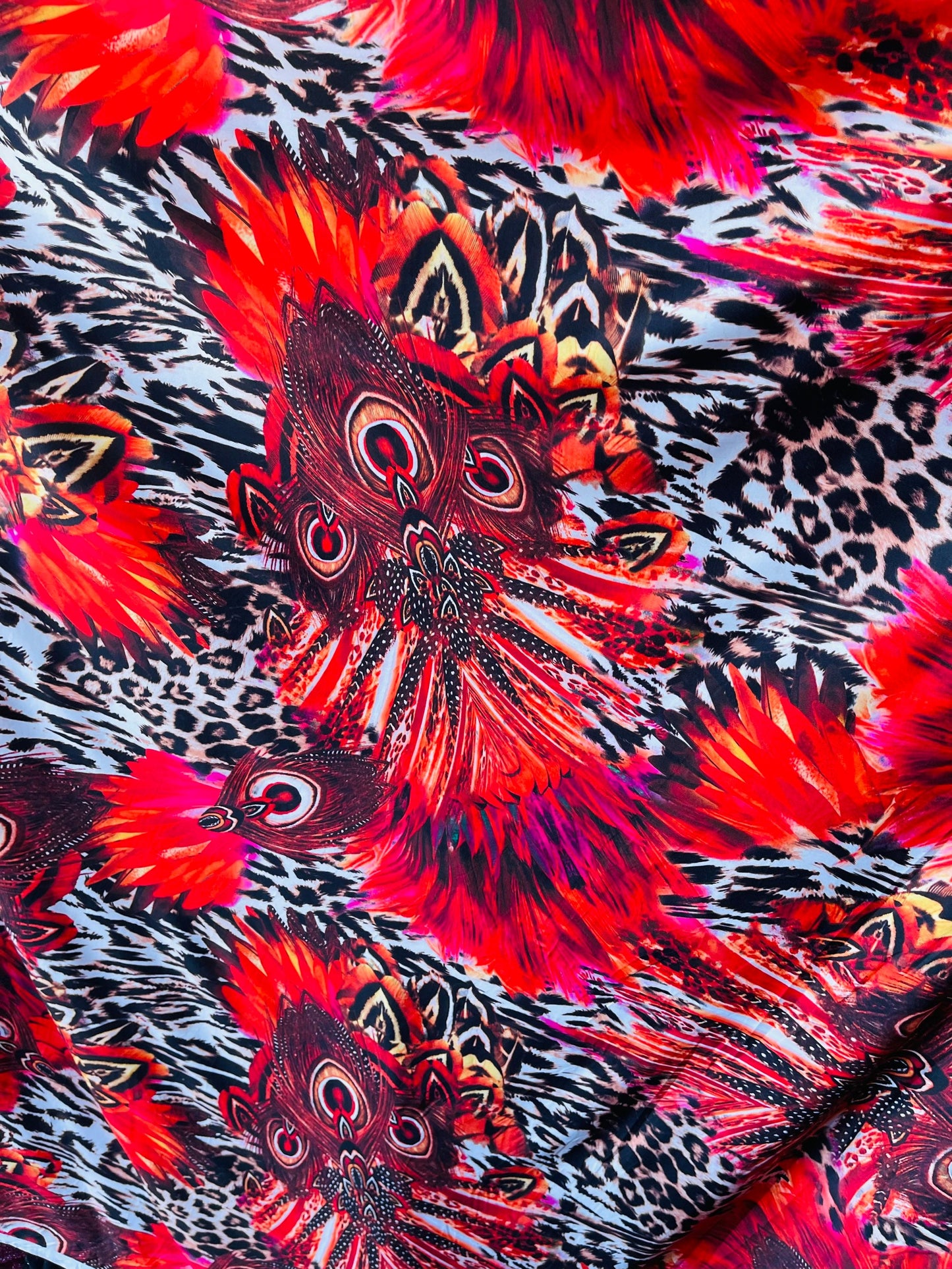 New Exotic peacock design animal print on poly spandex 4-way stretch medium weight 58/60” Sold by the YD. Ships Worldwide from Los Angeles