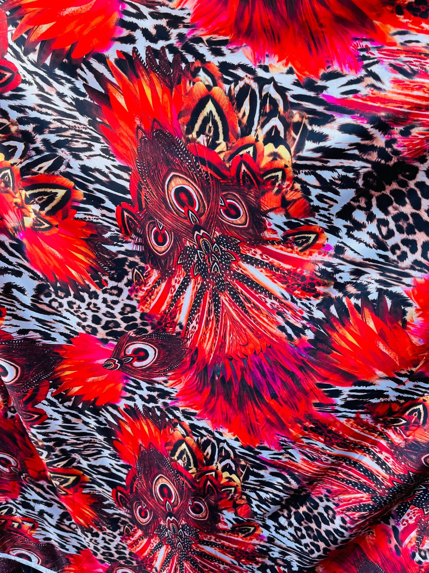 New Exotic peacock design animal print on poly spandex 4-way stretch medium weight 58/60” Sold by the YD. Ships Worldwide from Los Angeles