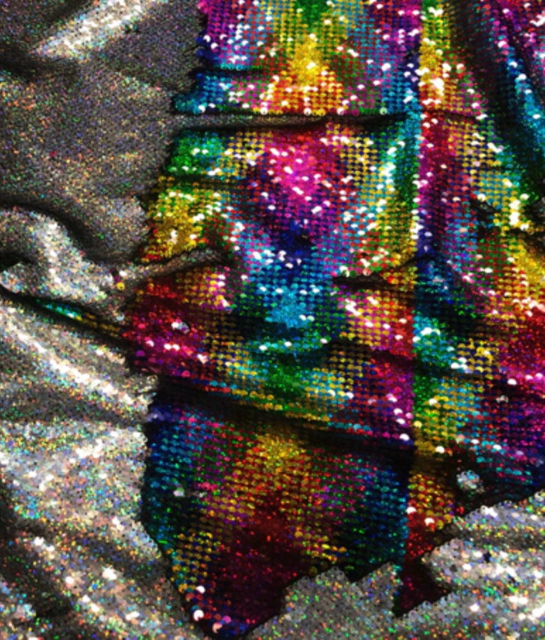 New hologram rainbow/silver mermaid sequins 2tone on spandex base 58/60" Sold by the YD. Ships worldwide from Los Angeles CA USA.