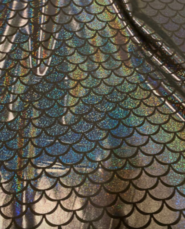 Mermaid hologram nylon spandex jumbo size fish scale metallic 4-way stretch 58/60” Sold by the YD. Ships Worldwide from Los Angeles CA