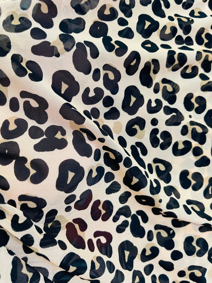 New Exotic Leopard design print on best quality of nylon power mesh 4-way stretch 58/60” Sold by the YD. Ships Worldwide from L.A CA.