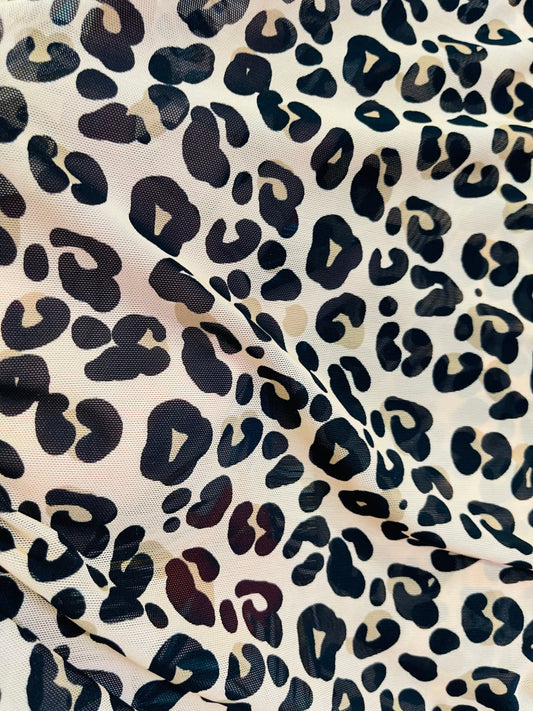 New Exotic Leopard design print on best quality of nylon power mesh 4-way stretch 58/60” Sold by the YD. Ships Worldwide from L.A CA.