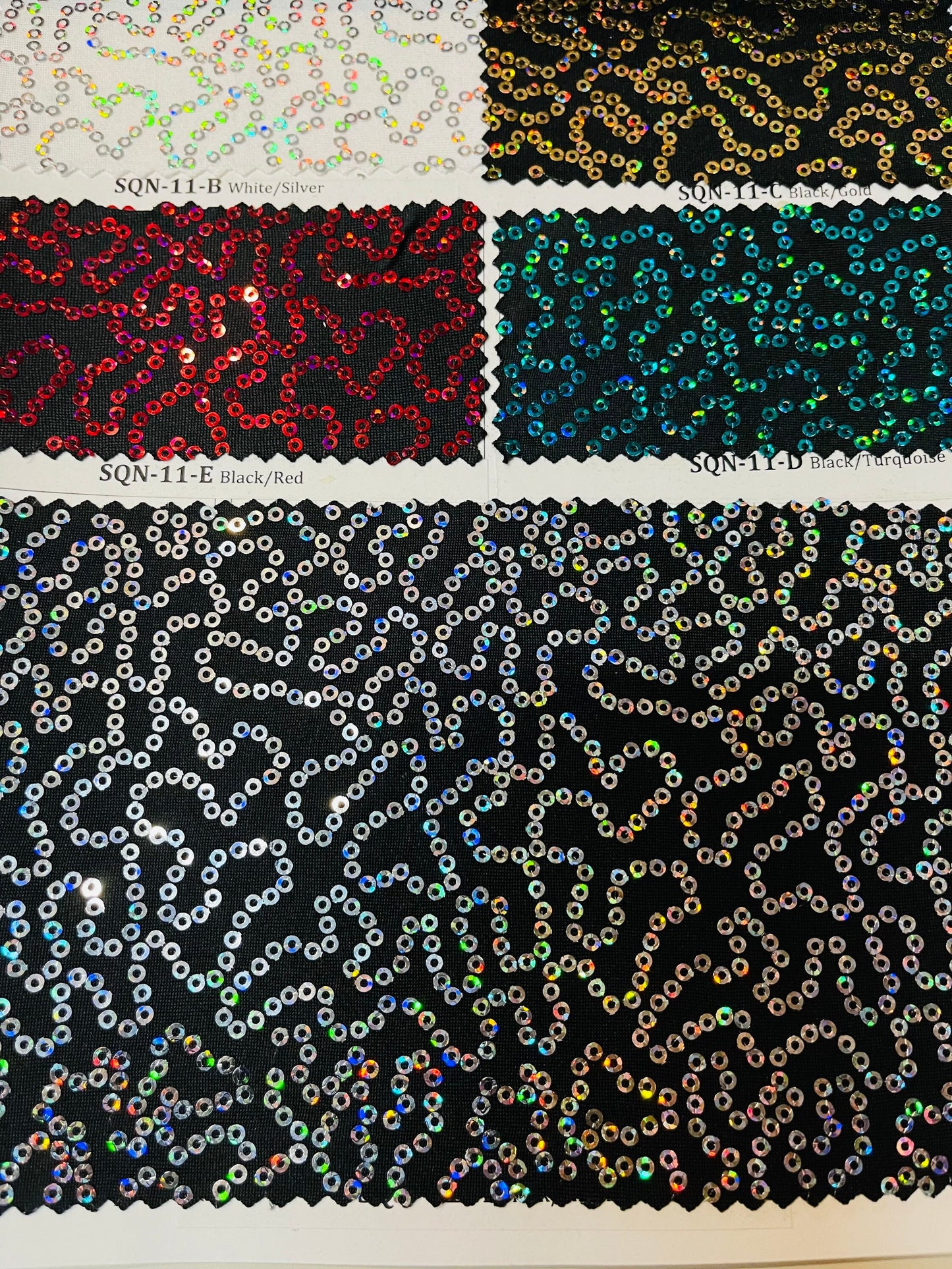 Luxury chain design hologram sequins embroidered on Spandex base 2-way stretch 58/60” Sold by the YD. Ships Worldwide from Los Angeles CA.