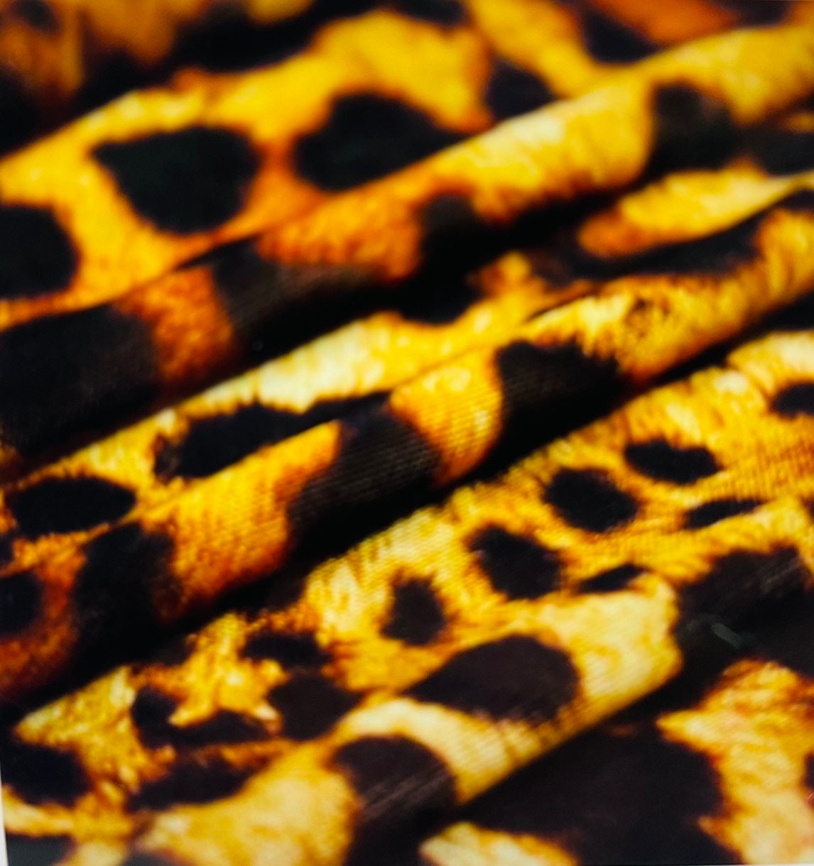 New Exotic Safari Leopard design print on best quality nylon Spandex 4-way stretch 58/60” Sold by the YD. Ships Worldwide from LA CA